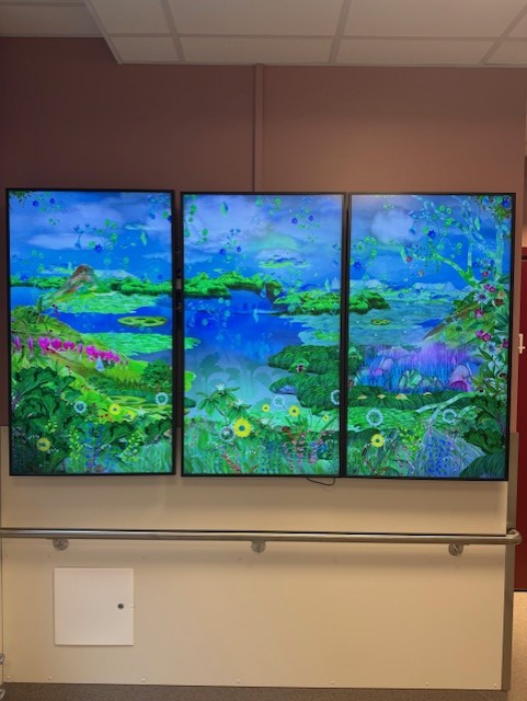 A couple of paintings on a wall